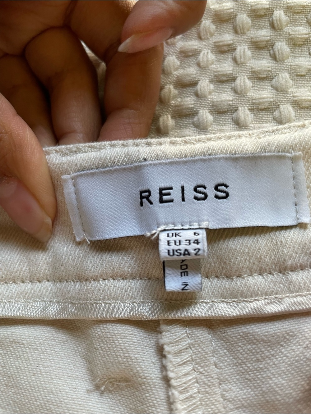 REISS Florence High Rise Flared Trousers in Cream - Picture 8 of 10